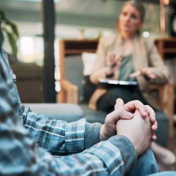 man attending psychotherapy session for drug addiction