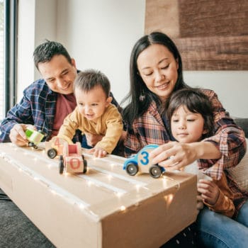 Parents spending time with children and able to communicated with their child who has autism