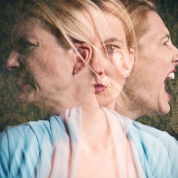 woman suffering from bipolar or disassociative personality disorder