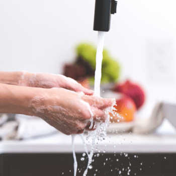 person obsessively washing hands