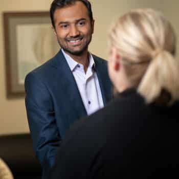 Dr. Patel shaking a patient's hand